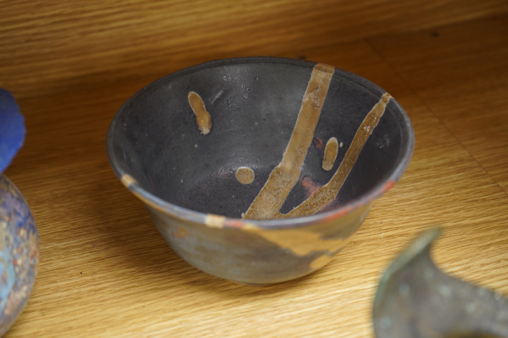 A collection of studio pottery to include crystalline glazed works by Stephen R Jones Des, Brighton, vases and a pair of dishes, largest 22cm high